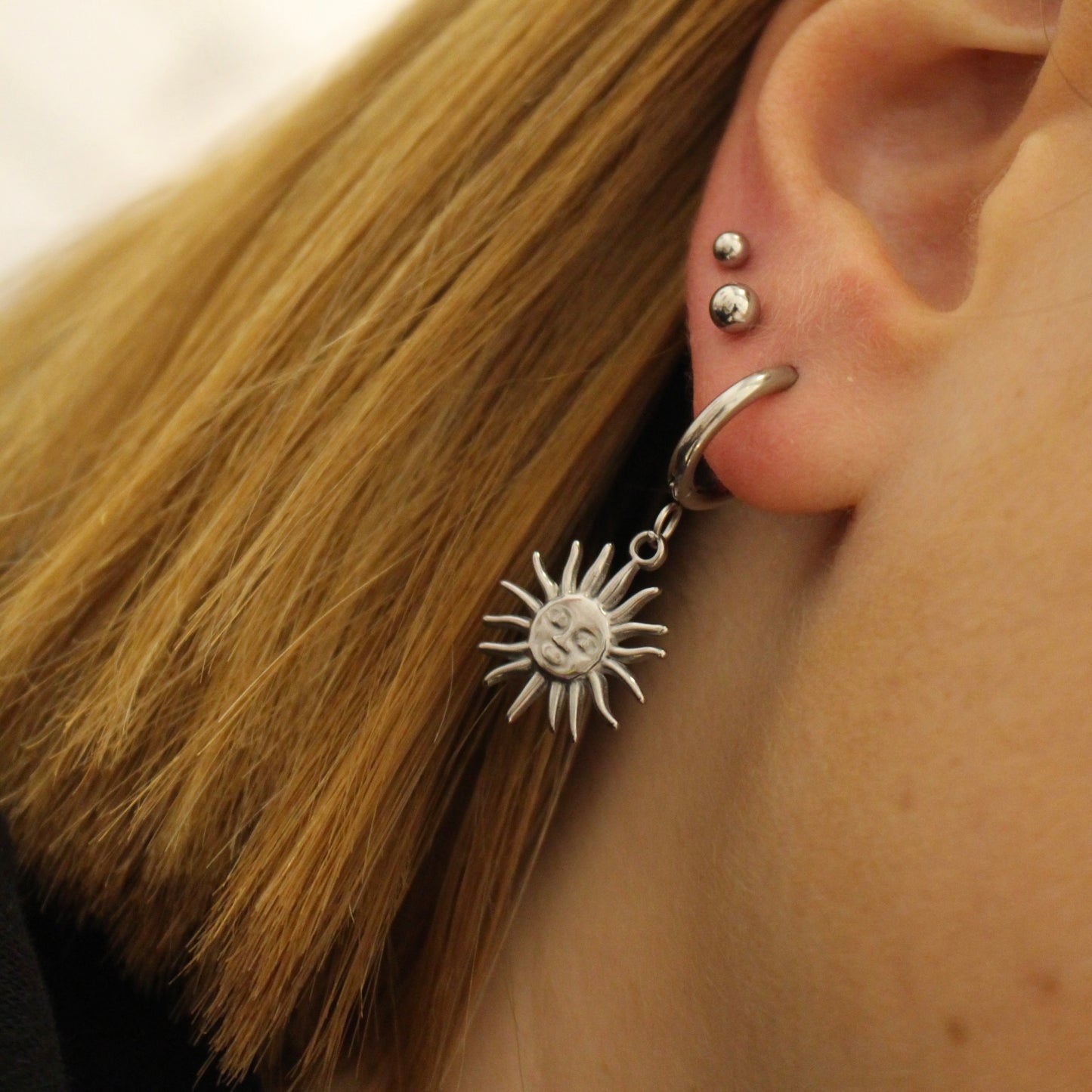 Brincos Sol