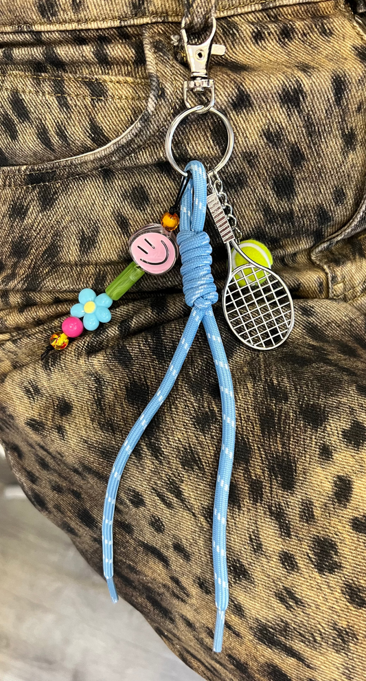 BAG CHARMS. LOJA FÍSICA LISBOA. MAD IN PARADISE. RAQUETE TÉNIS.