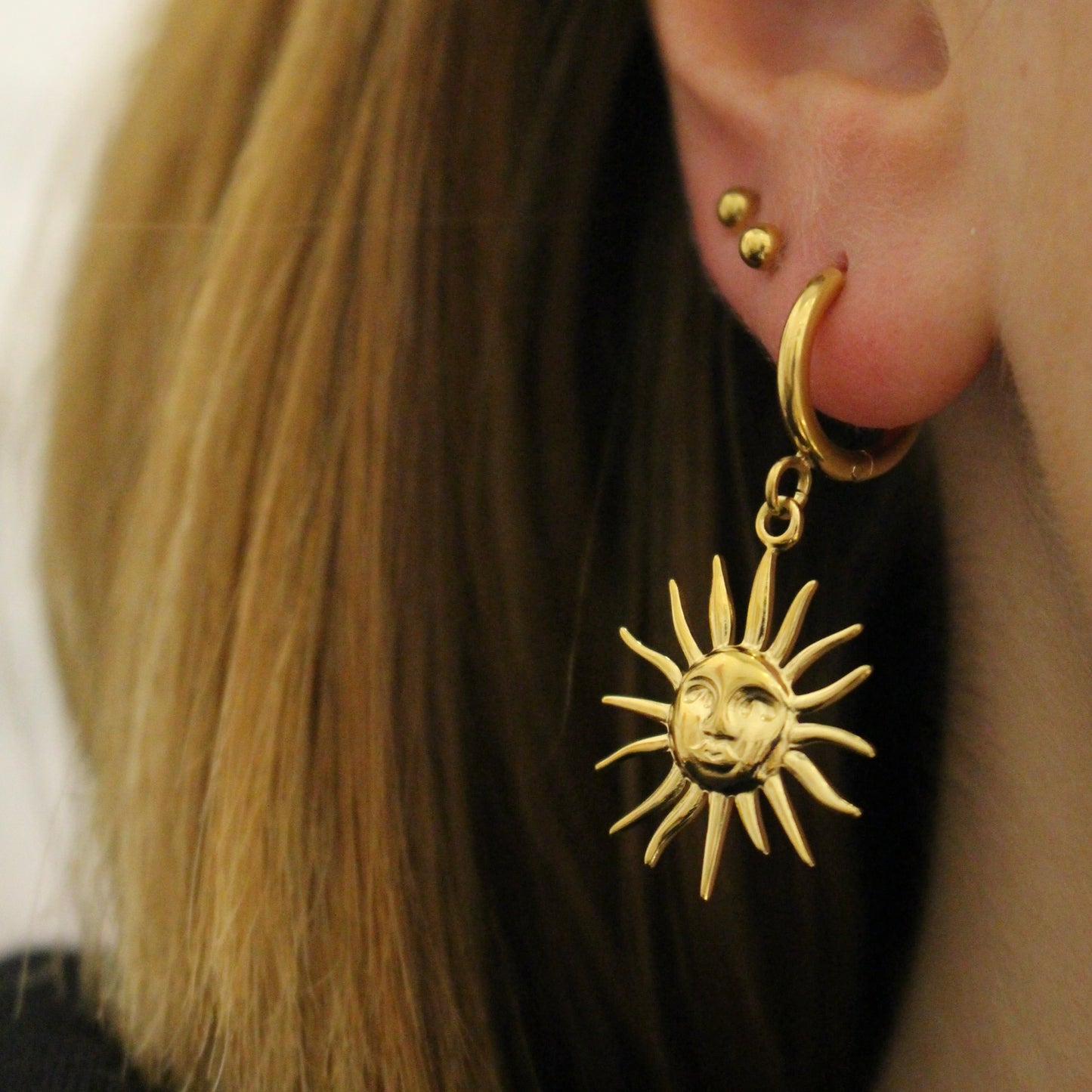 Brincos Sol